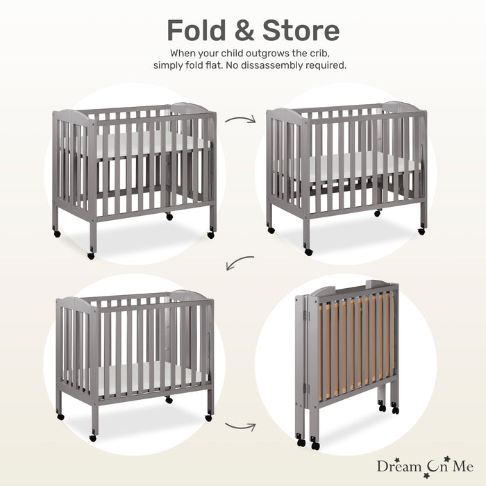 Mini crib folding on sale