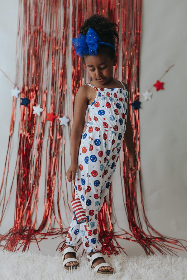 Dream Big Little Co STAR SPANGLED SMILES DREAM SMOCKED JUMPSUIT