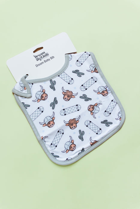 Dream Big Little Co EXCLUSIVE MOO-VING FAST DREAM BABY BIB