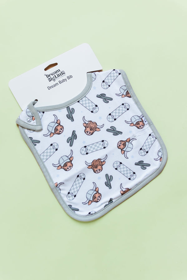 Dream Big Little Co EXCLUSIVE MOO-VING FAST DREAM BABY BIB