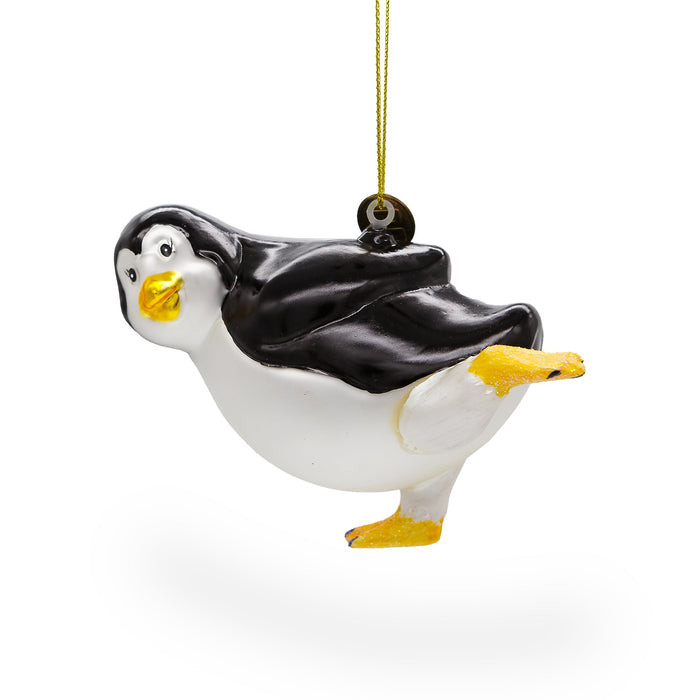 BestPysanky Playful Penguin Skating - Blown Glass Christmas Ornament