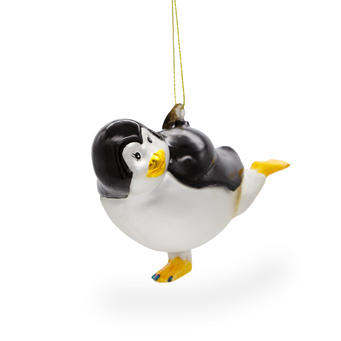 BestPysanky Playful Penguin Skating - Blown Glass Christmas Ornament