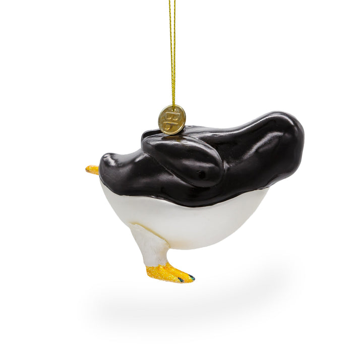 BestPysanky Playful Penguin Skating - Blown Glass Christmas Ornament