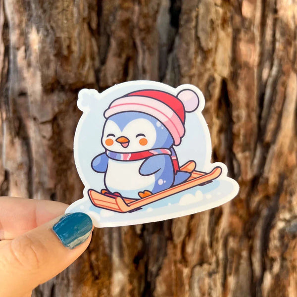 Stick With Finn Sledding Penguin Sticker