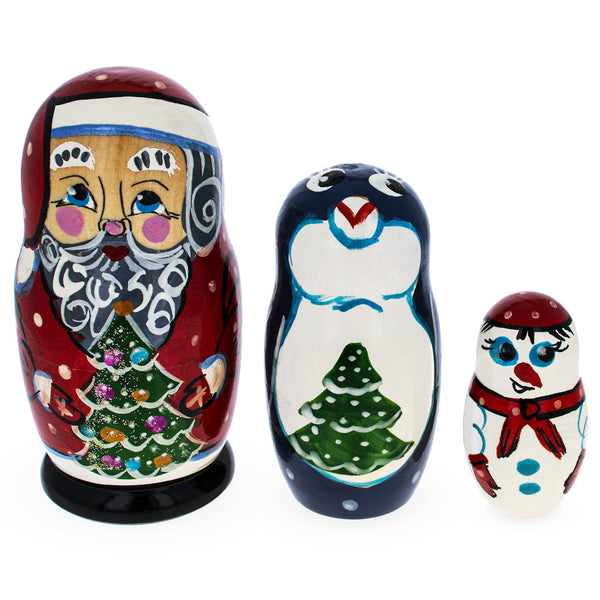 BestPysanky Set of 3 Santa, Penguin and Snowman Wooden Nesting Dolls