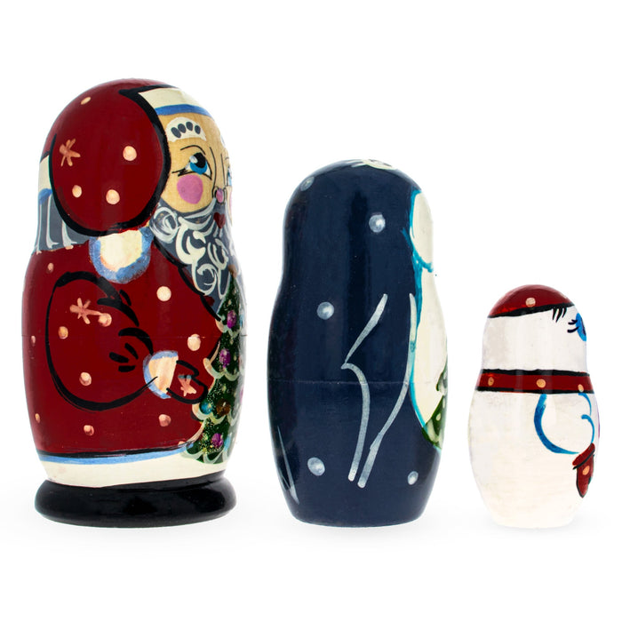 BestPysanky Set of 3 Santa, Penguin and Snowman Wooden Nesting Dolls